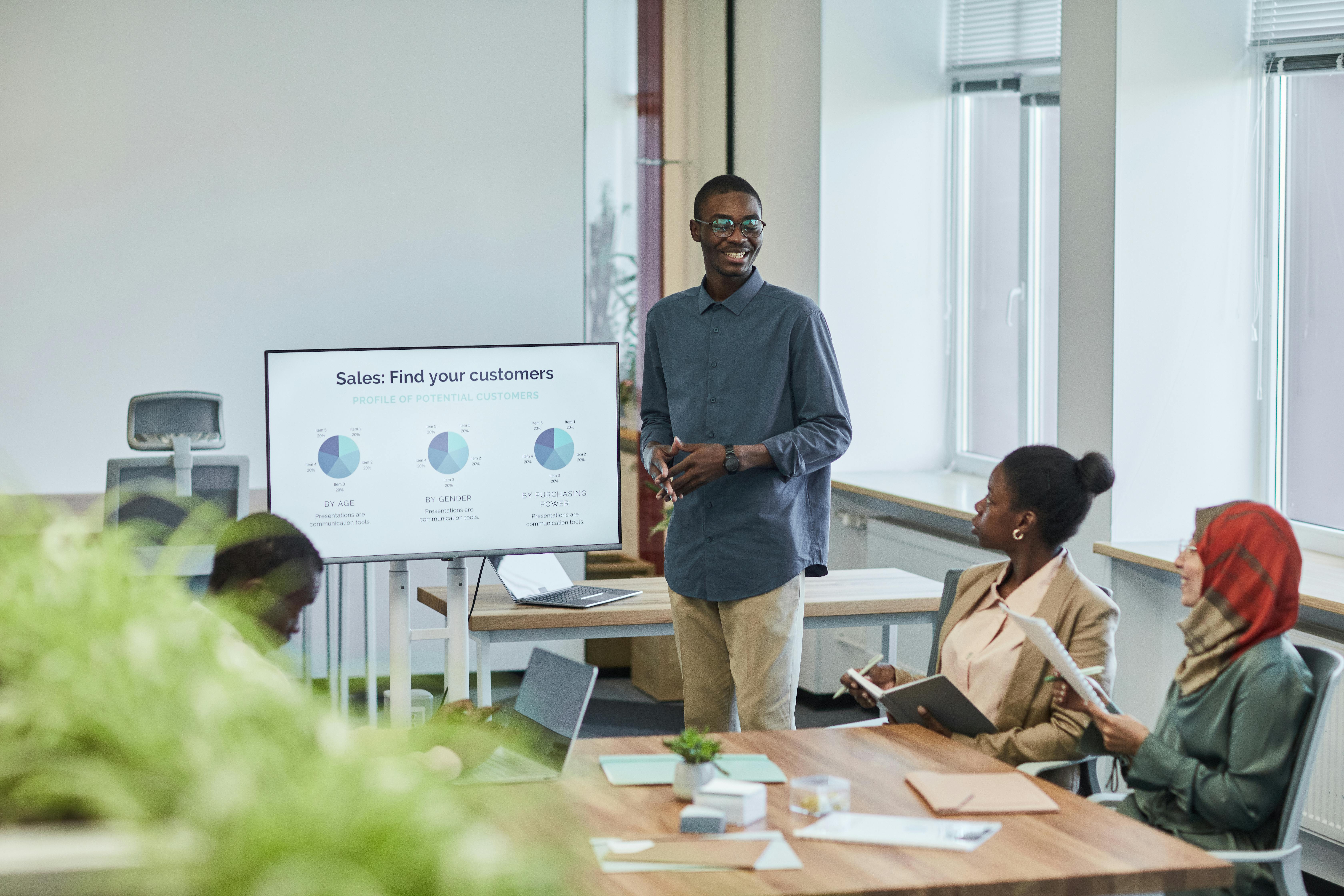 Team reviewing campaign charts in a strategy presentation